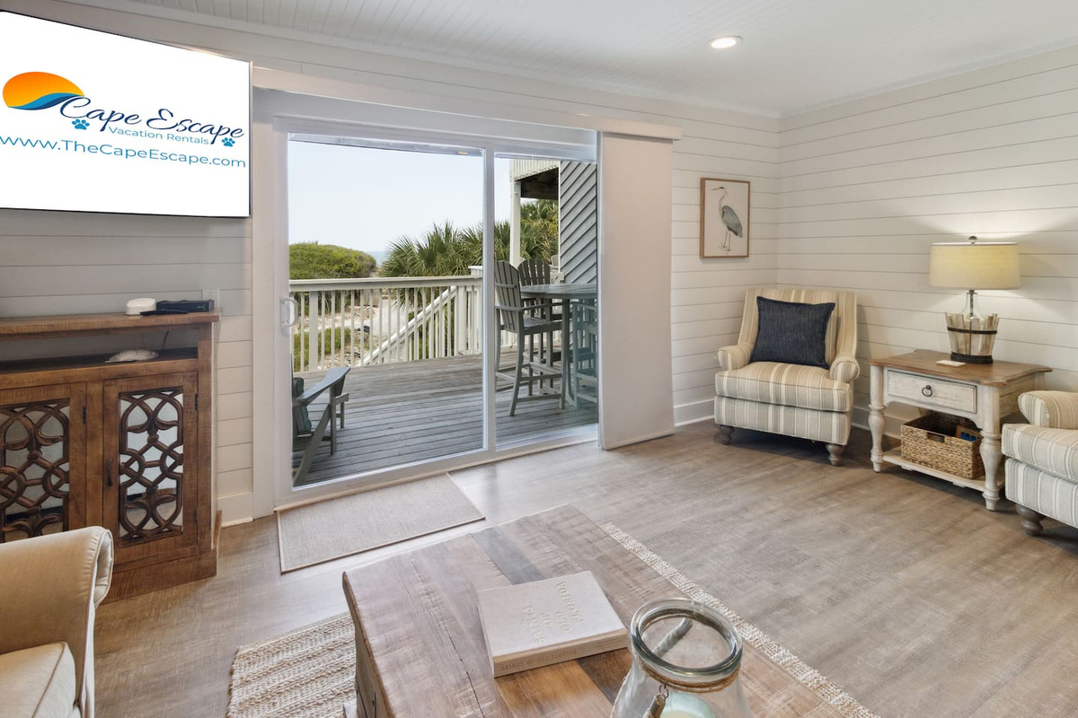 Gas grill, Polywood dining, lounge chairs &mdash; the main deck is fully set up for your best vacation dinner.
