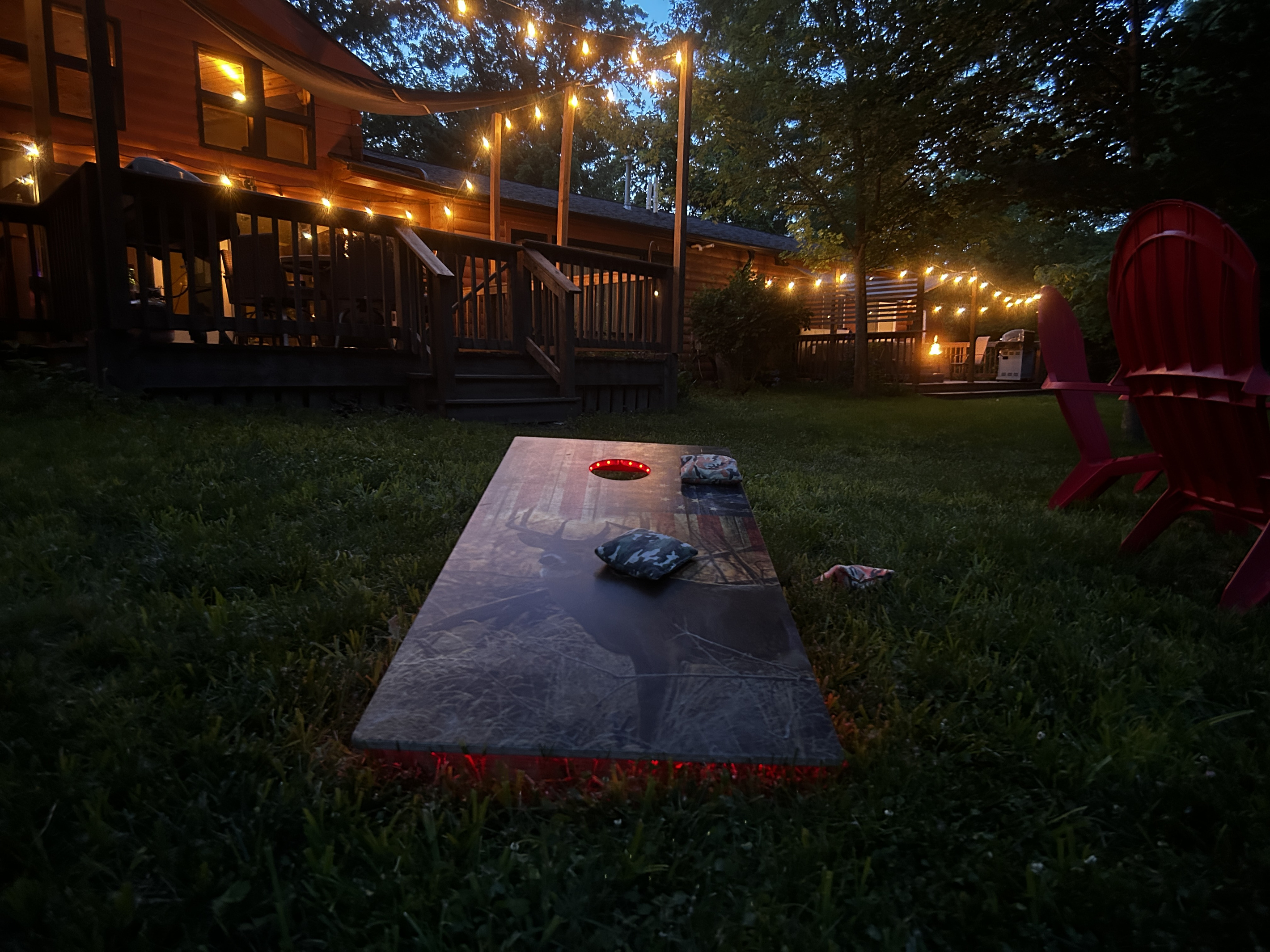 Increase the difficulty level of your corn hole game by playing at night with the LED lights lighting up the boards.