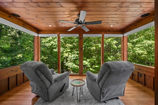 Unwind and read in the sunroom with spectacular view