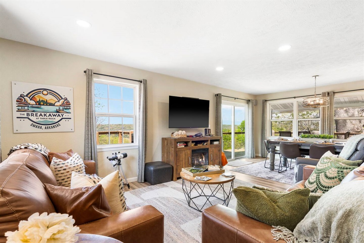 Bright living space with stunning Ozark lake scenery.