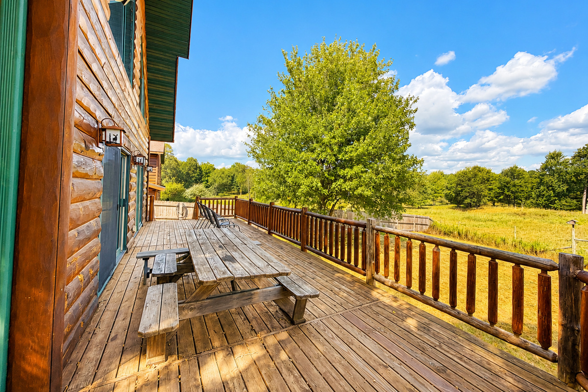 Spacious deck with picnic table seating gives your group an easy place for outdoor meals, fresh air and a spot to enjoy watching the wildlife.