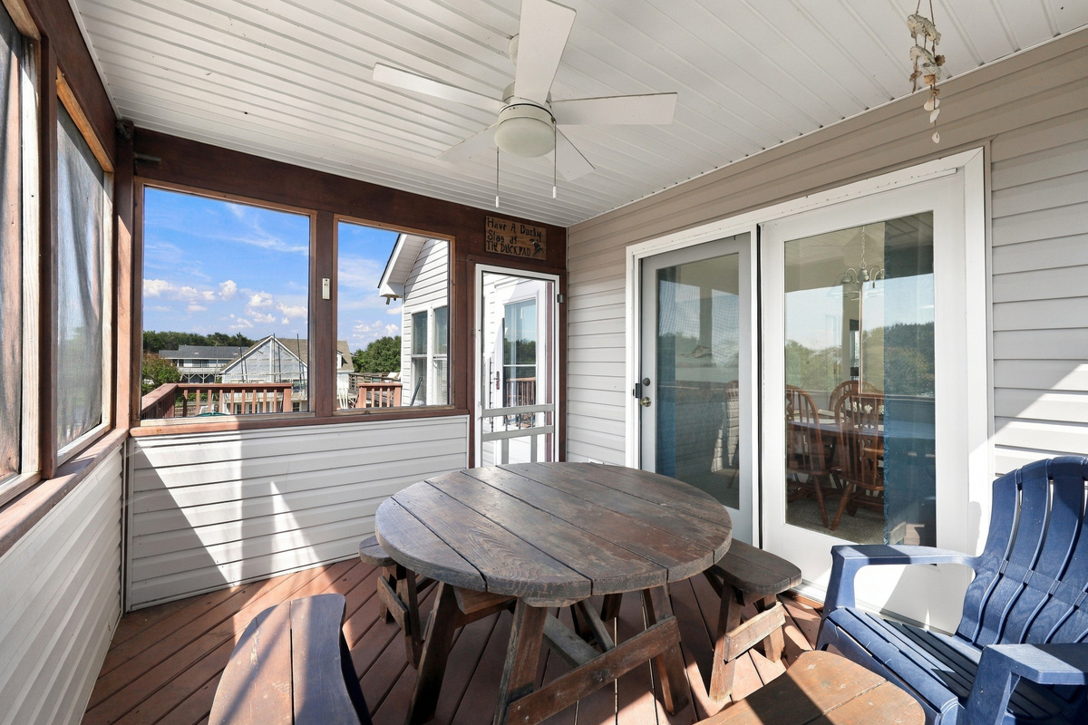 Sip your morning coffee bug-free on the screened porch, just off the dining area.
