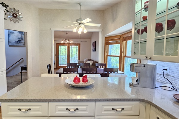 Large prep area with 4 barstools