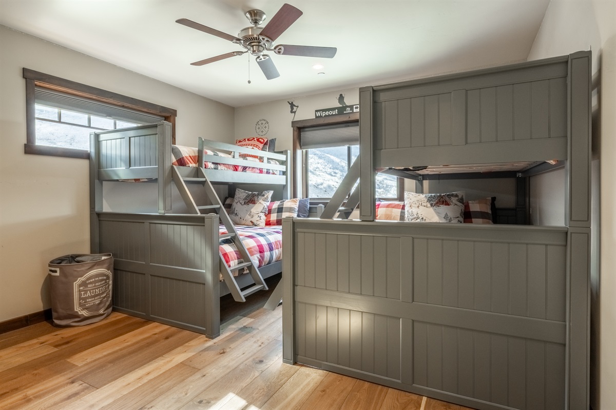 Rest easy in the bunkroom’s two queen beds and two XL twin beds—perfect for kids or adults who need plenty of space to stretch out.