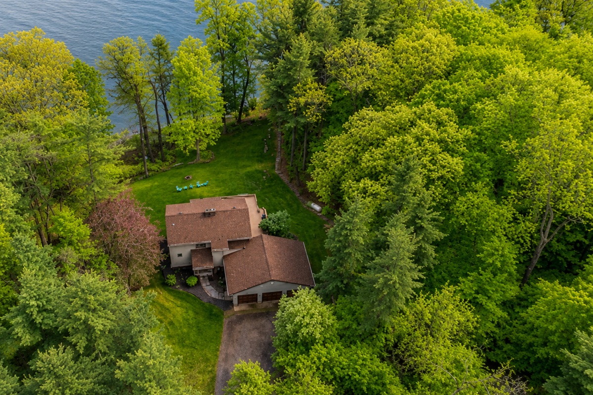 Secluded lakefront home surrounded by lush forest with private access to the water—your ultimate Finger Lakes escape. 🏡🌳🌊