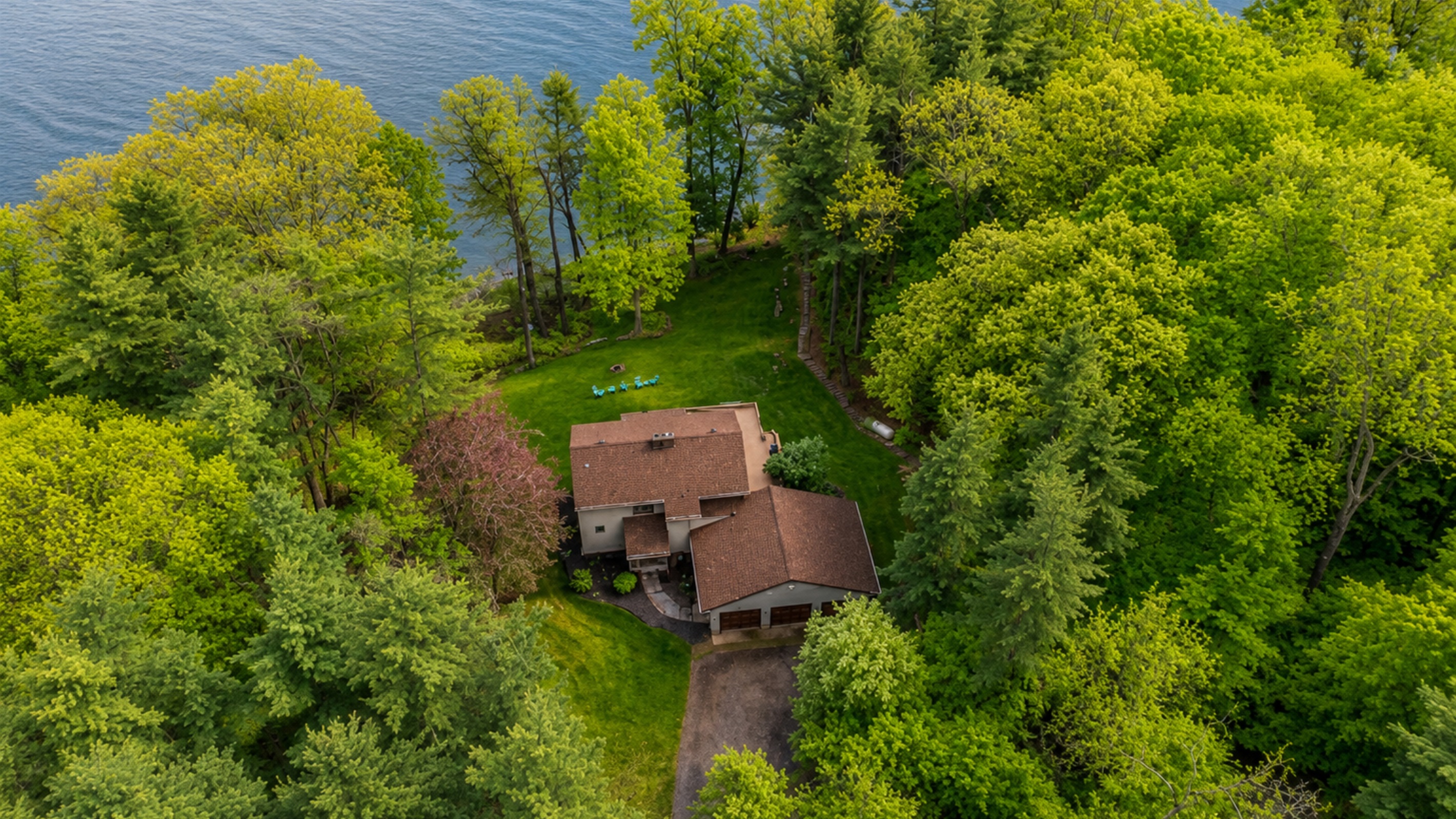 Secluded lakefront home surrounded by lush forest with private access to the water—your ultimate Finger Lakes escape. 🏡🌳🌊
