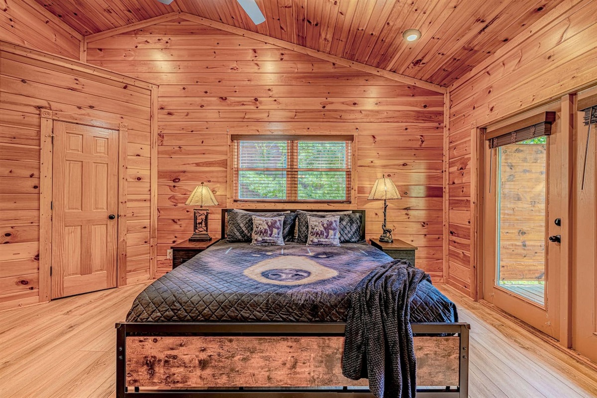 King bedroom with private en-suite bath &mdash; one of five king rooms at The Crown Jewel. Every guest gets their own bedroom and bathroom. Gatlinburg, TN.