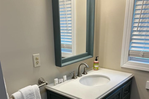 Full Bathroom located in hallway between bedroom 2 and 3