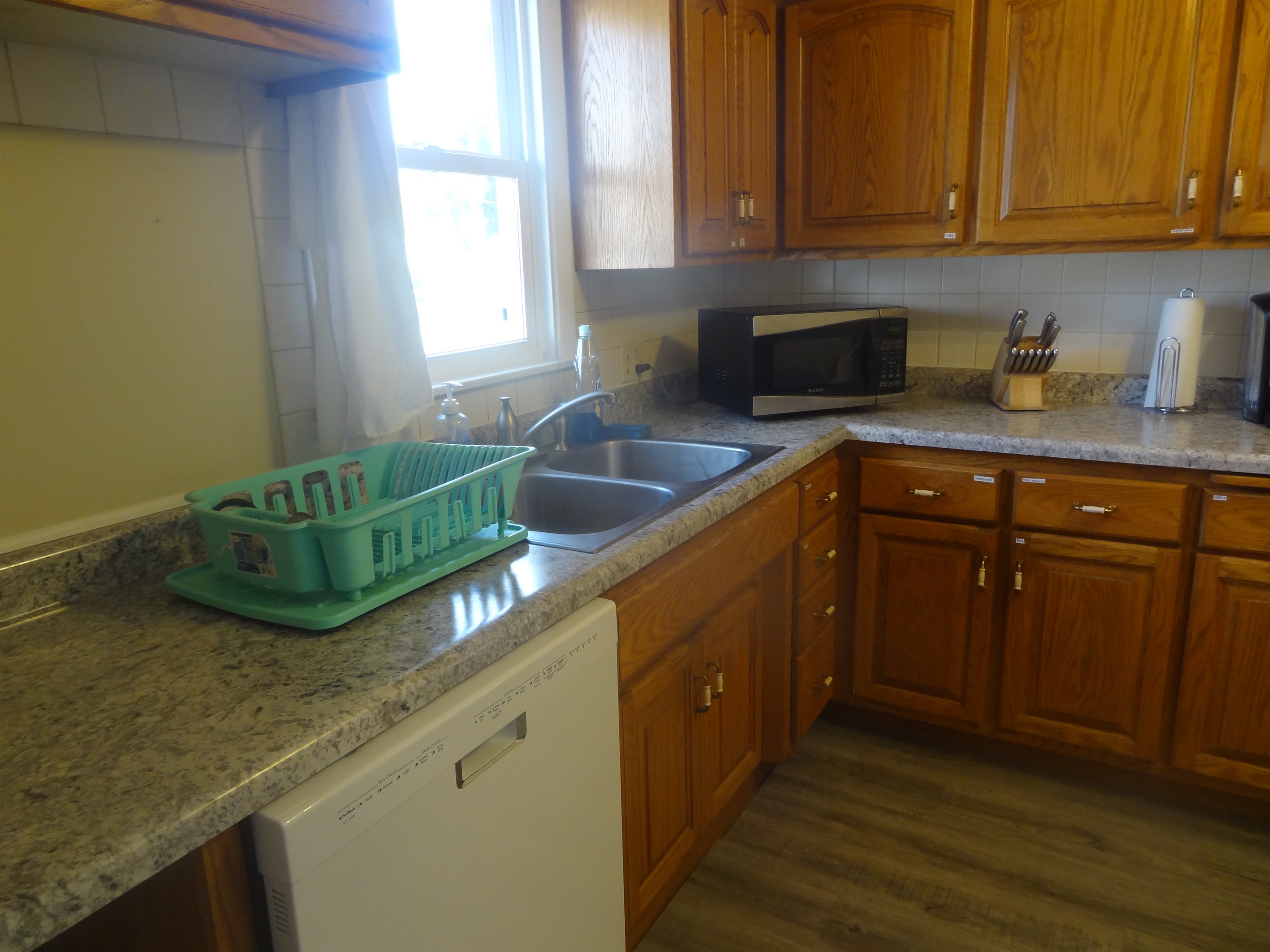 Full kitchen with stove, refrigerator, dish washer, microwave, coffee makers, pots/pans, and most other essentials.