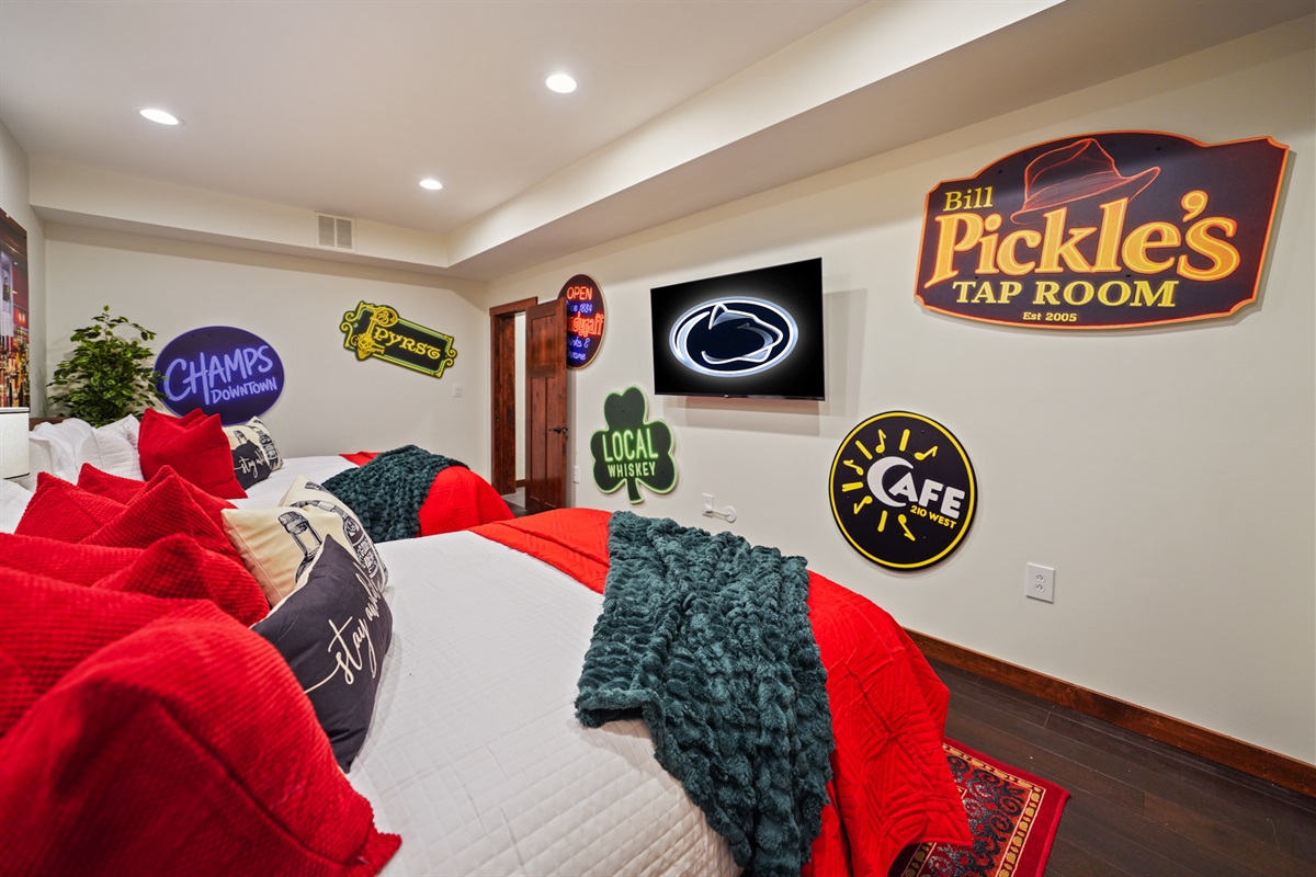 Spacious basement guest suite with themed décor and plenty of room to relax after a full day out.