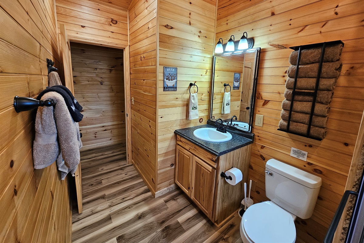 Fresh towels, warm lighting, and a touch of rustic charm make even getting ready feel relaxing.