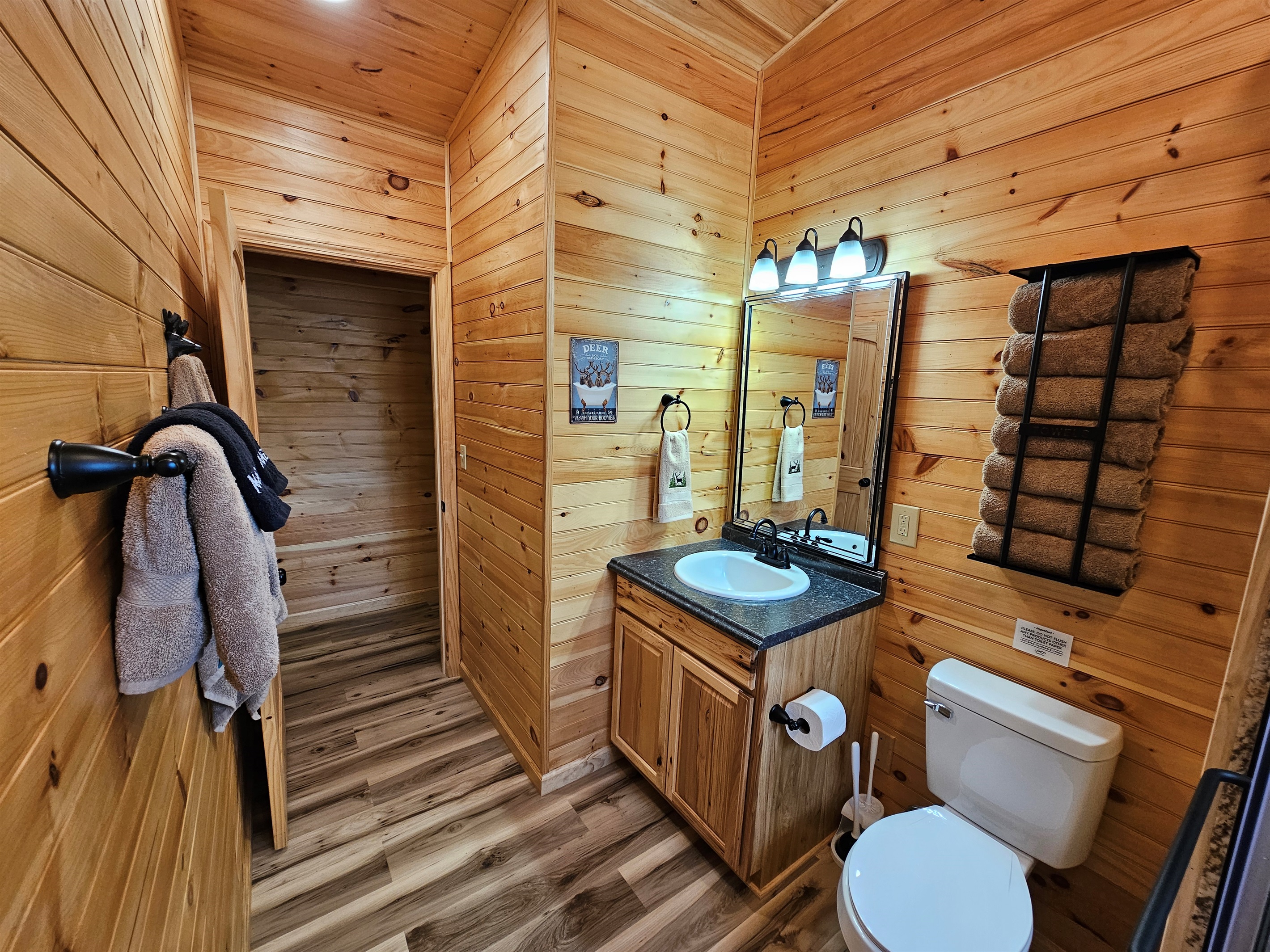 Fresh towels, warm lighting, and a touch of rustic charm make even getting ready feel relaxing.