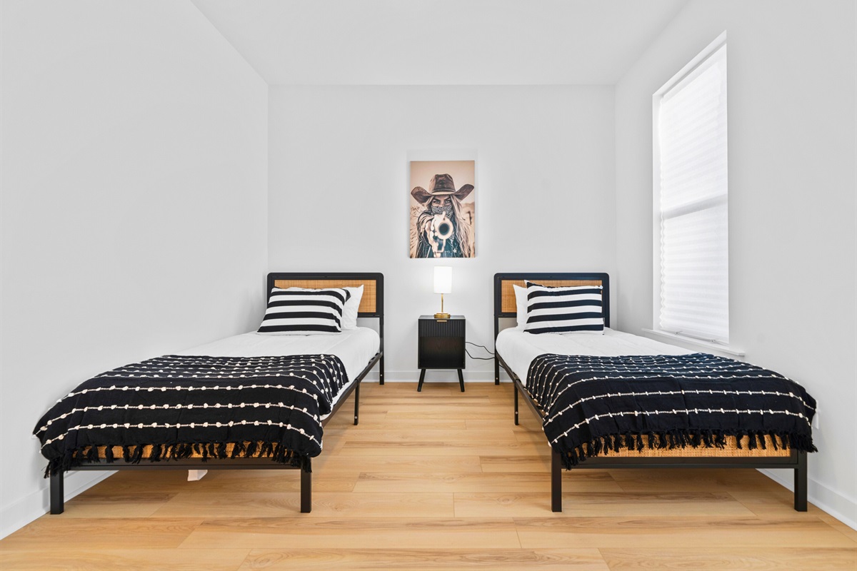 Multiple beds make this space ideal for shared stays without feeling cramped.