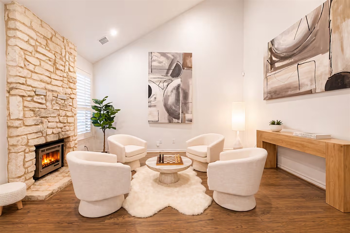Cozy conversation space with fireplace—perfect for unwinding after a long day