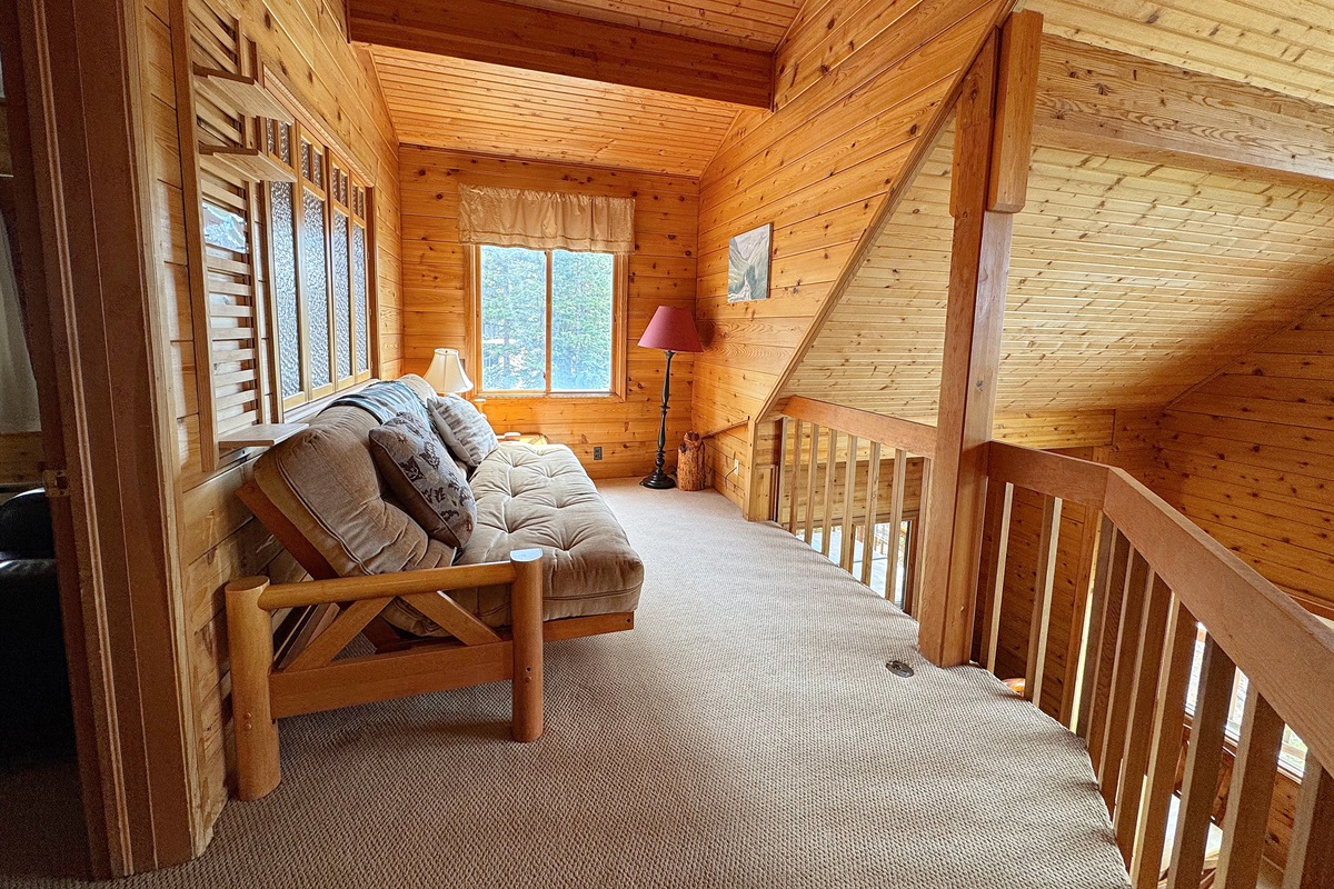 Loft with futon on upper level