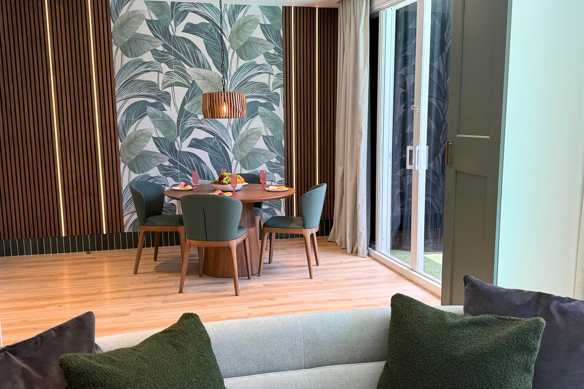 Gorgeous dining room is right off of the patio