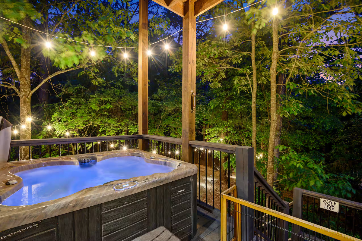 Hot Tub Oasis: Relax under twinkling lights amidst nature's tranquility. Perfect for starlit evenings!