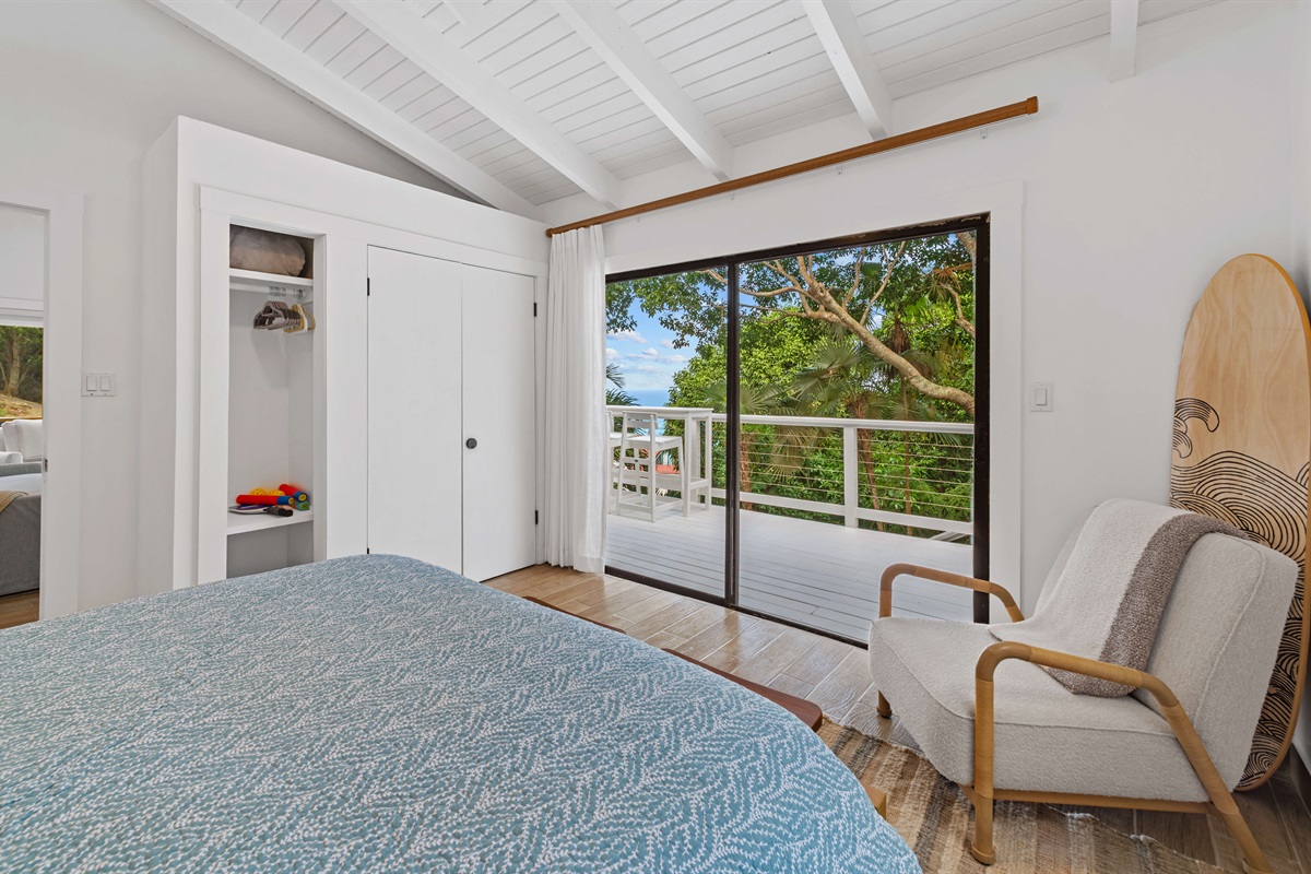 Sliding glass door right out to the pool deck and a closet to unpack during your stay