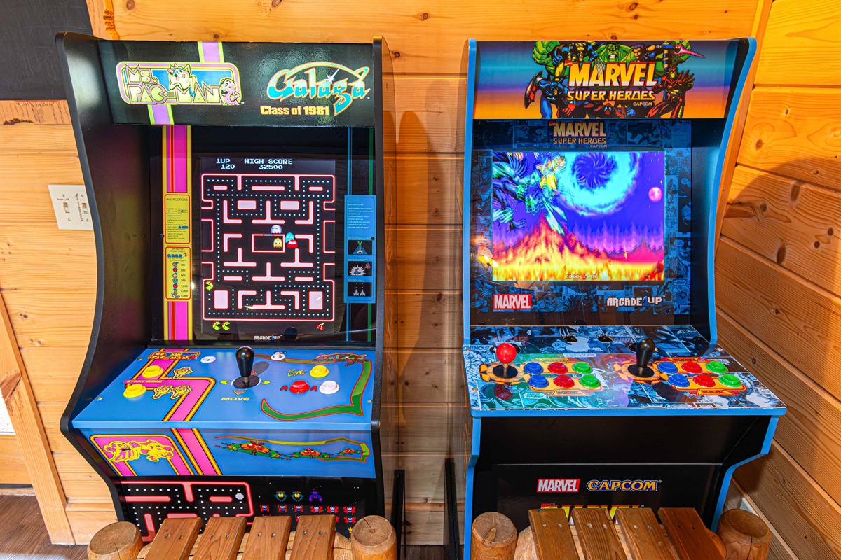 Downstairs Game Room: Challenge friends to classic arcade battles in our retro gaming paradise!