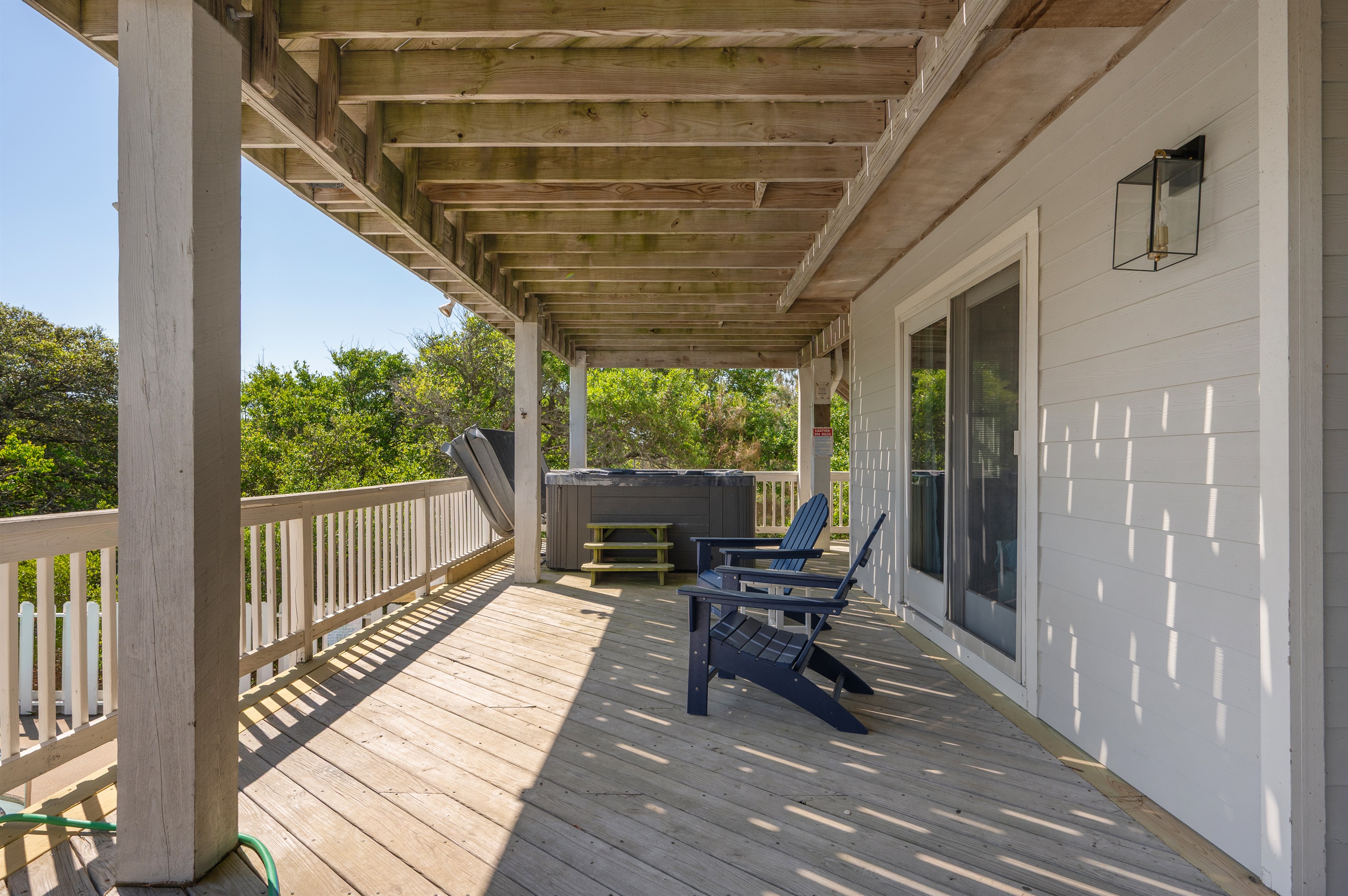 Private hot tub for your enjoyment. The deck overlooks the pool area