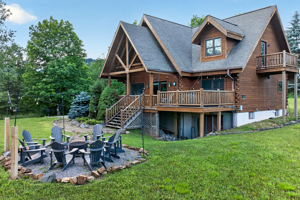 Outdoor fire pit off the front porch. 