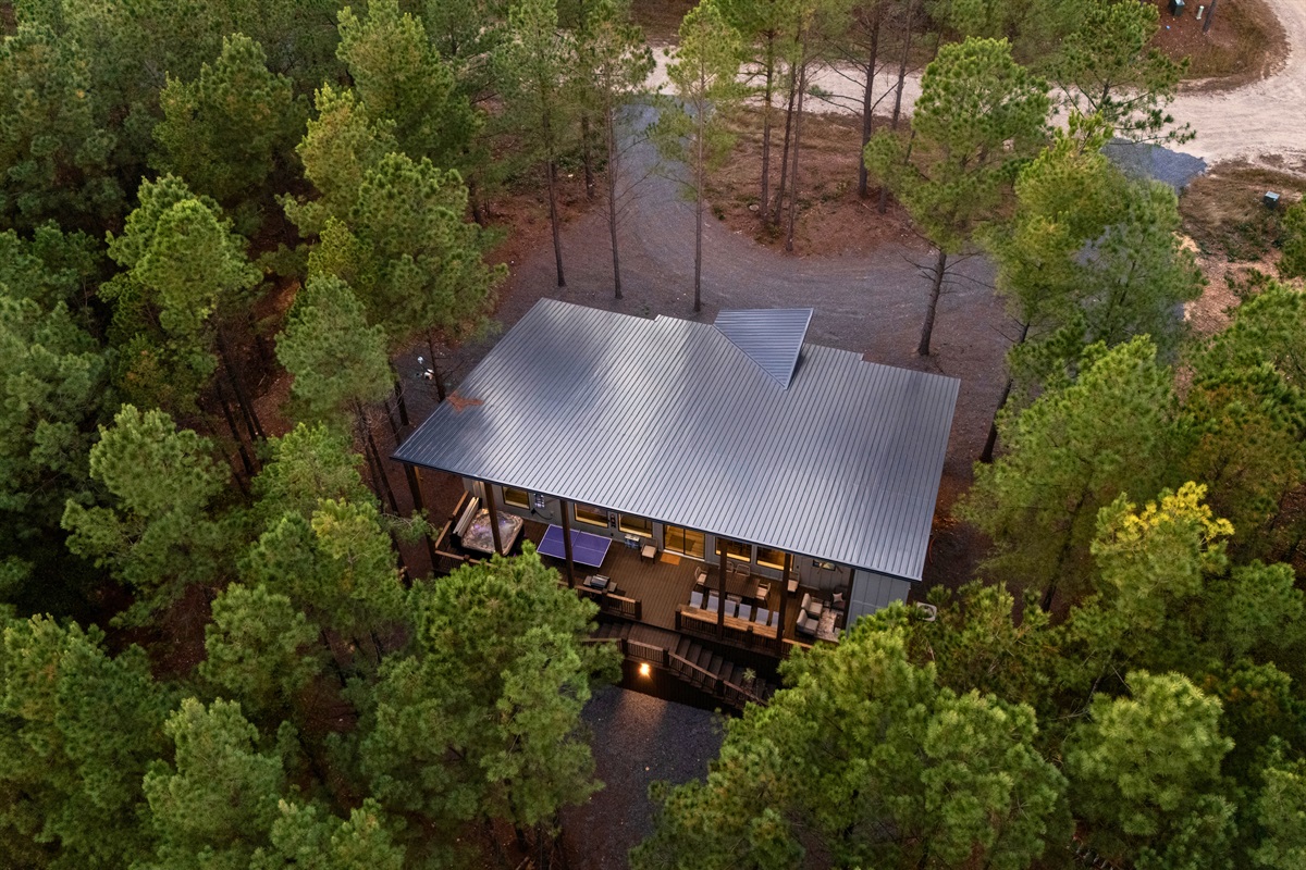 A stunning top-down view highlights just how private and beautifully situated Casa Verde is among the trees.