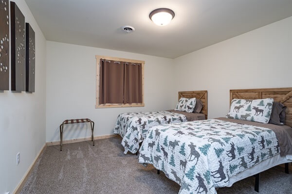 Bed 5 has 2 twin beds and is located on the lower level