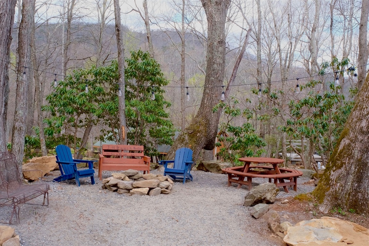Community fire pit area is right outside your cabin