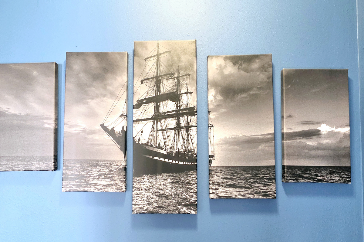 Tall-ship wall art in the living area
