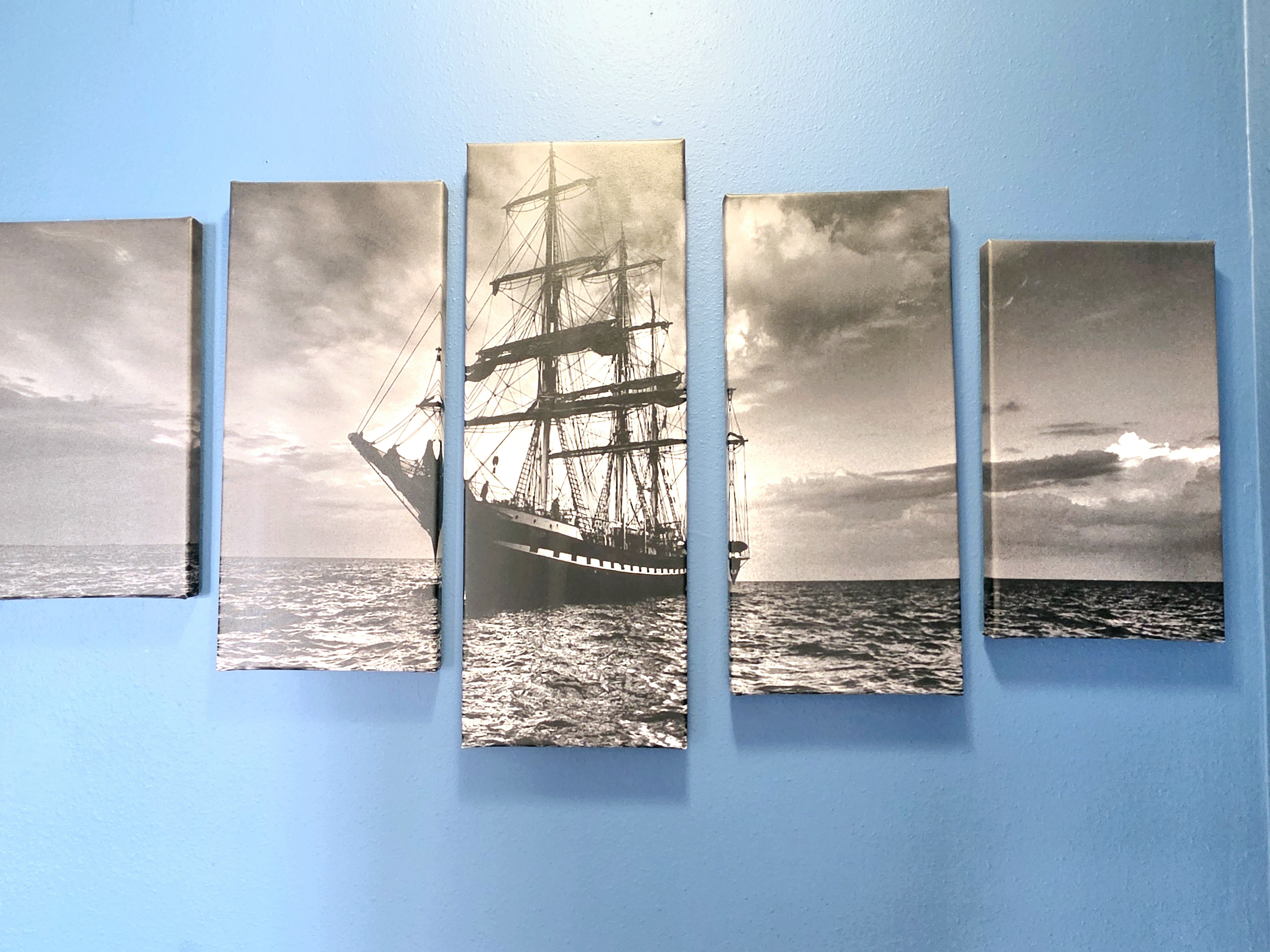Tall-ship wall art in the living area