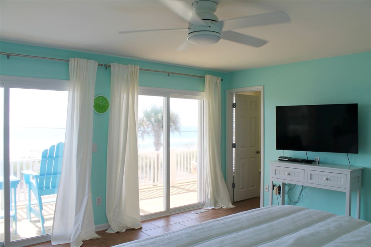 Master bedroom looking out at oceanfront view. PRIVATE 2nd floor balcony. 