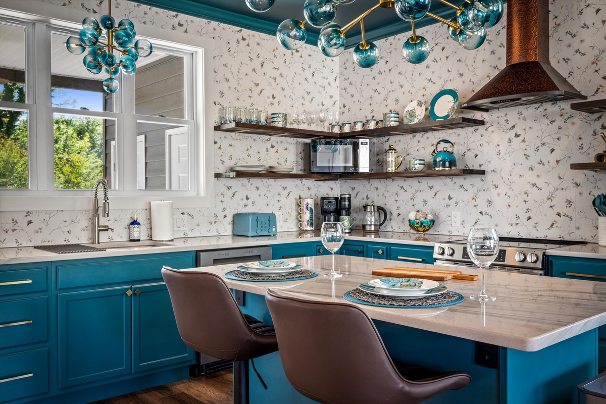 The kitchen was designed to be both beautiful and functional, whether you're preparing a quick breakfast or a special dinner together.
