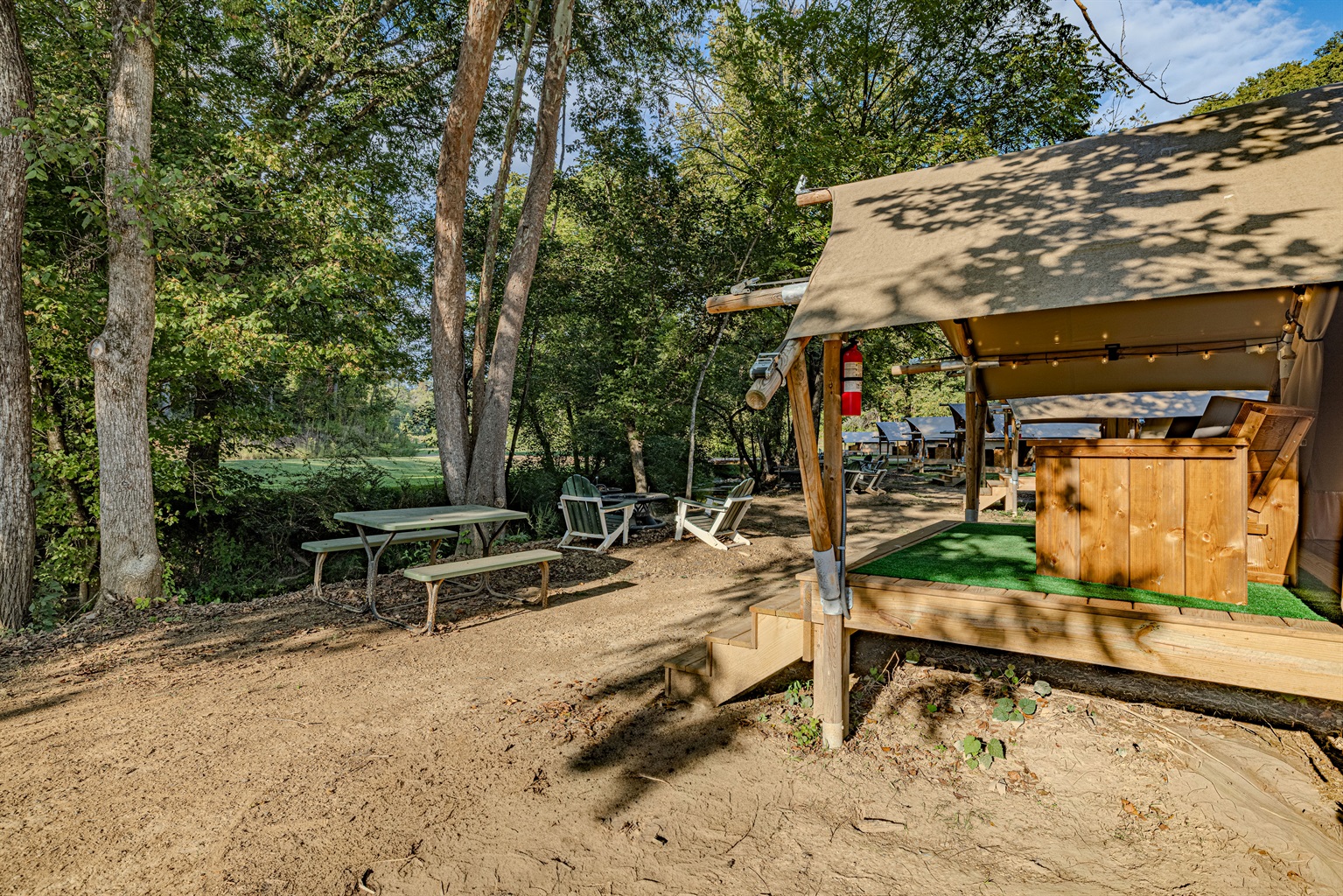 Grilling, dining, and relaxing. Your glamping experience extends far beyond the tent with this beautiful, private area for all your outdoor activities.