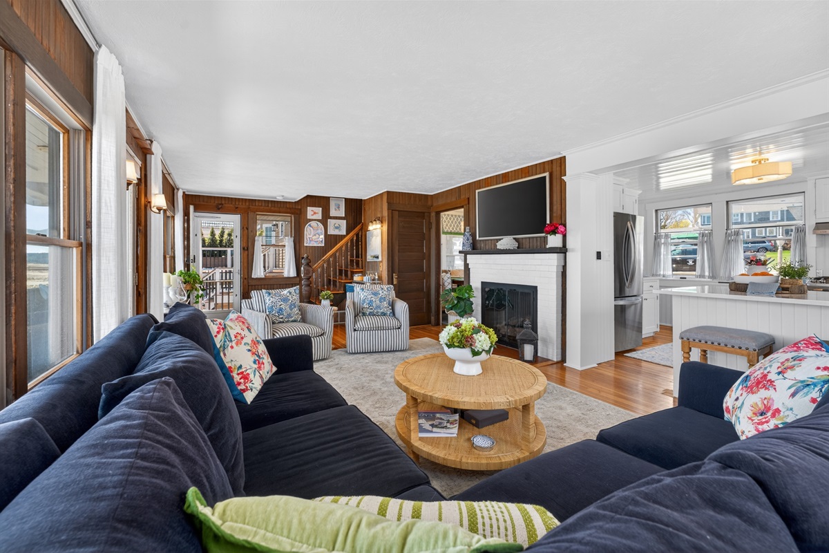 Relax in this inviting living room with cozy seating and classic coastal charm, perfect for unwinding after a day by the ocean. 🌊