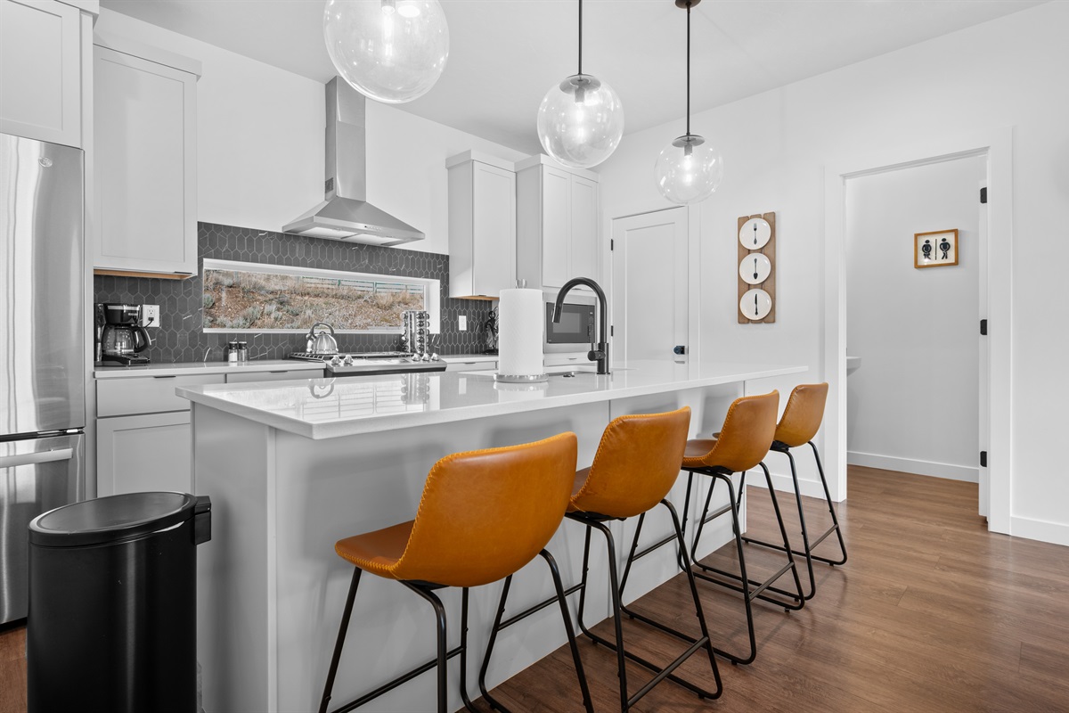 Beautiful kitchen with large island and seating for casual meals.