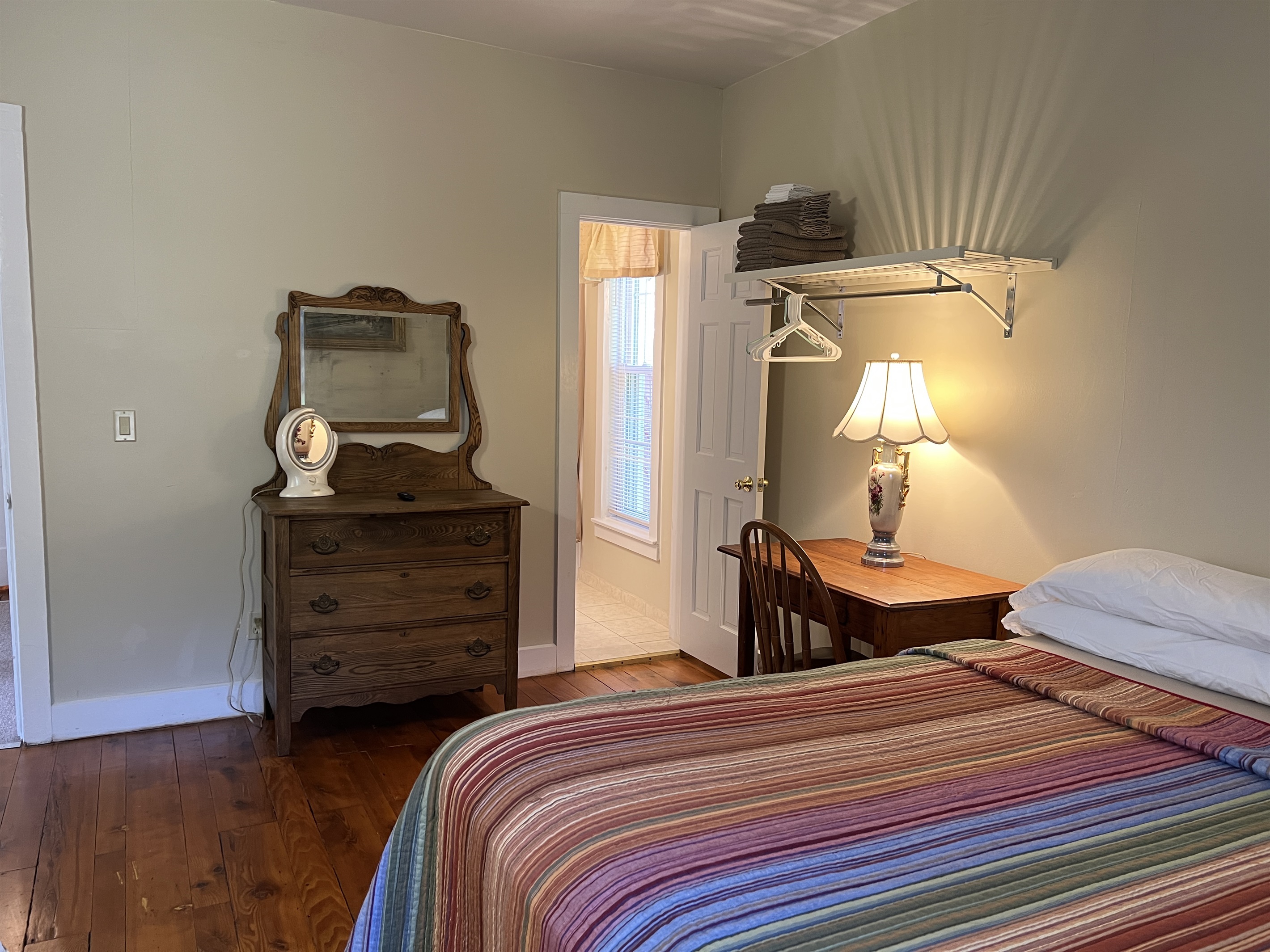Bedroom #4 with desk area and en-suite bathroom.