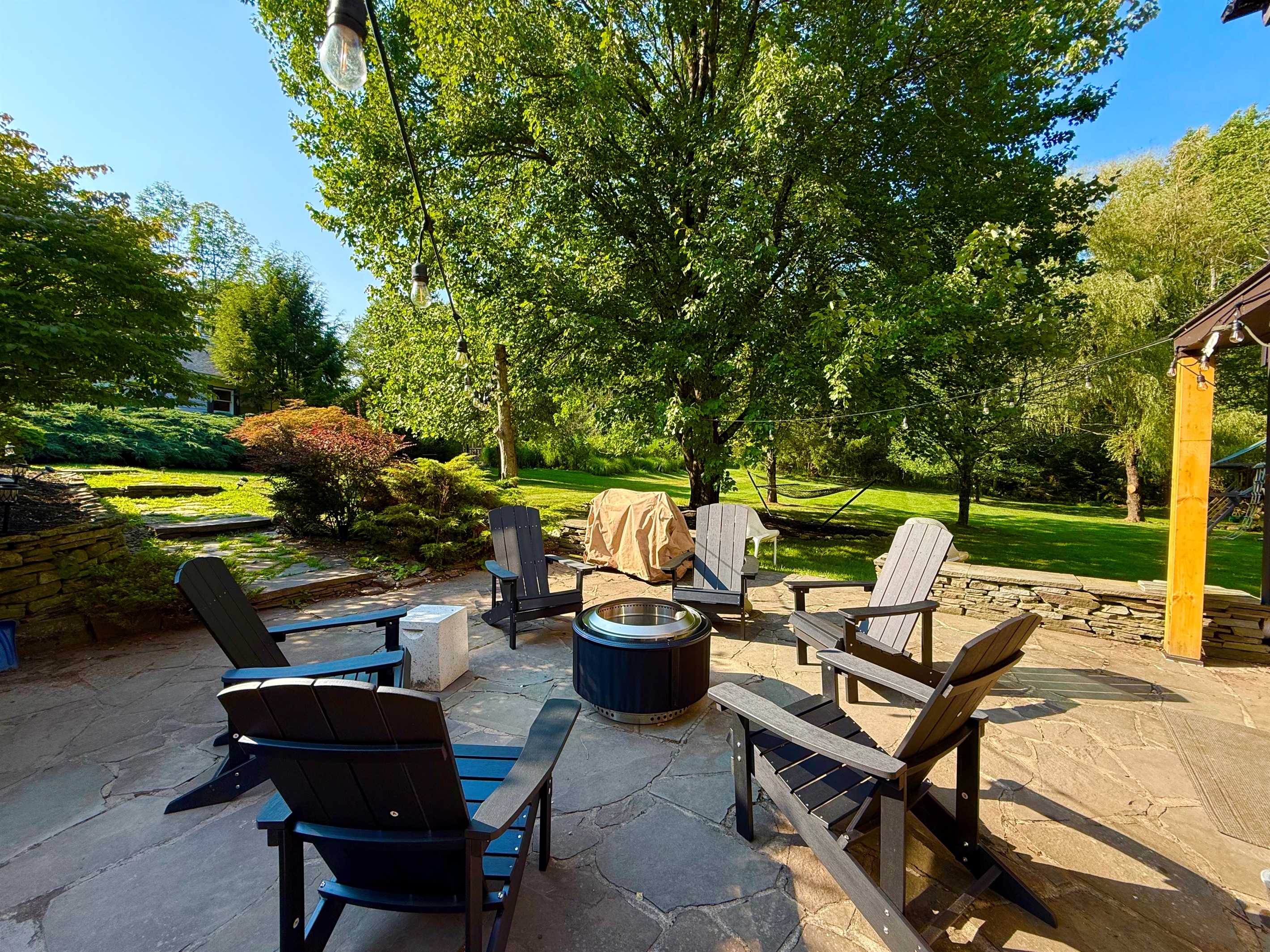 Patio with Solo fire pit and firewood