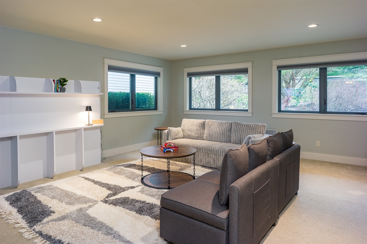 Separate and enclosed media room offers a variety of sleeping options including a Murphy bed and queen pull-out bed.  