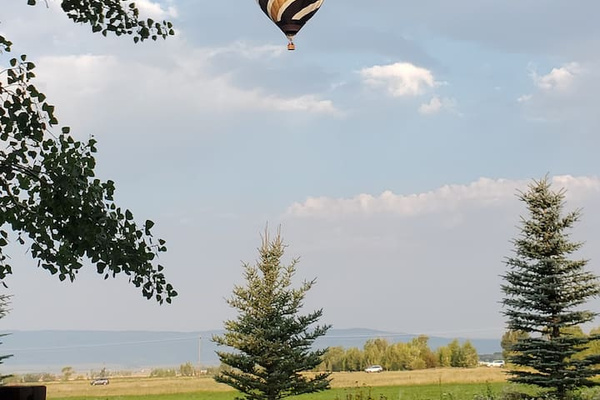 Hot air balloons often float over the house on clear summer days!