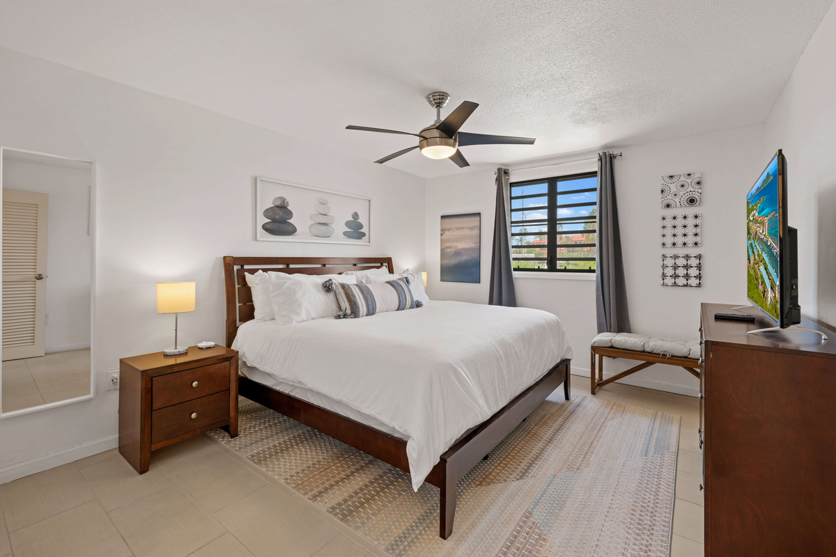 Comfortable king bed to relax in after a long each day and a full length mirror to check your fit before leaving!