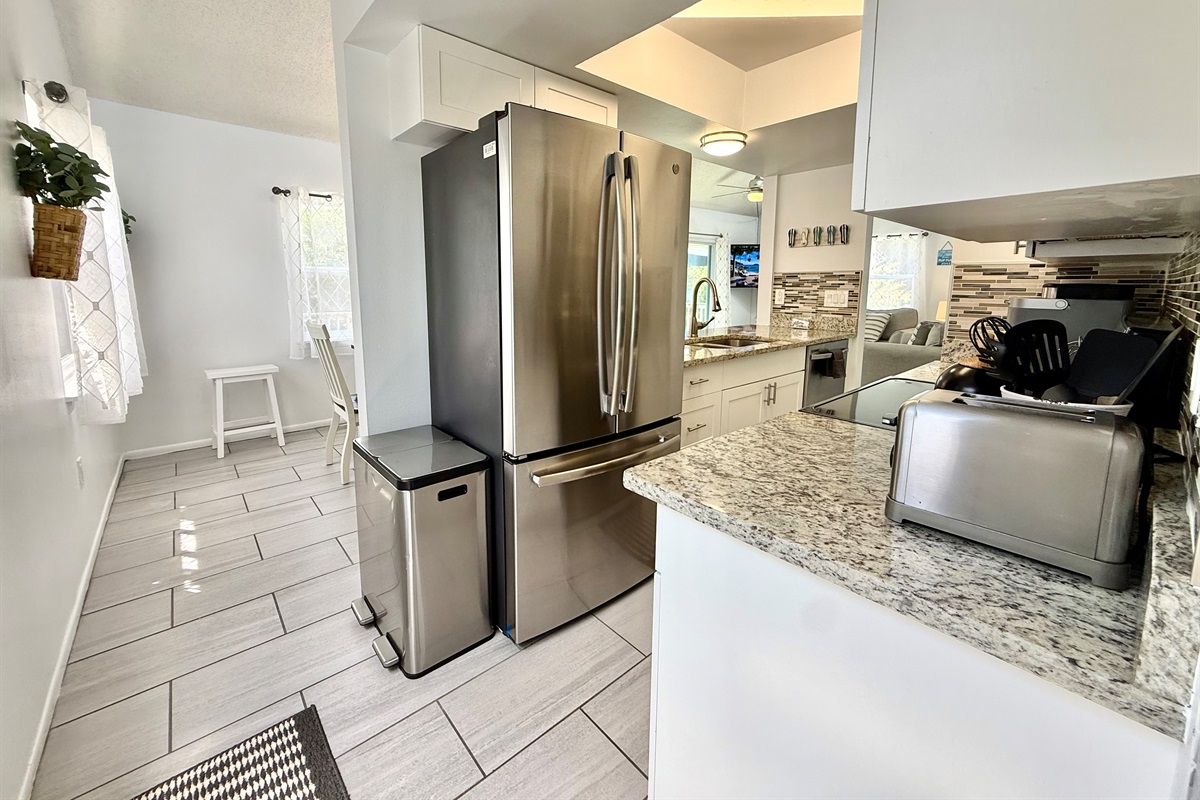 Cook like a pro in this modern kitchen with plenty of counter space, quality cookware, and everything you need for home-cooked favorites.