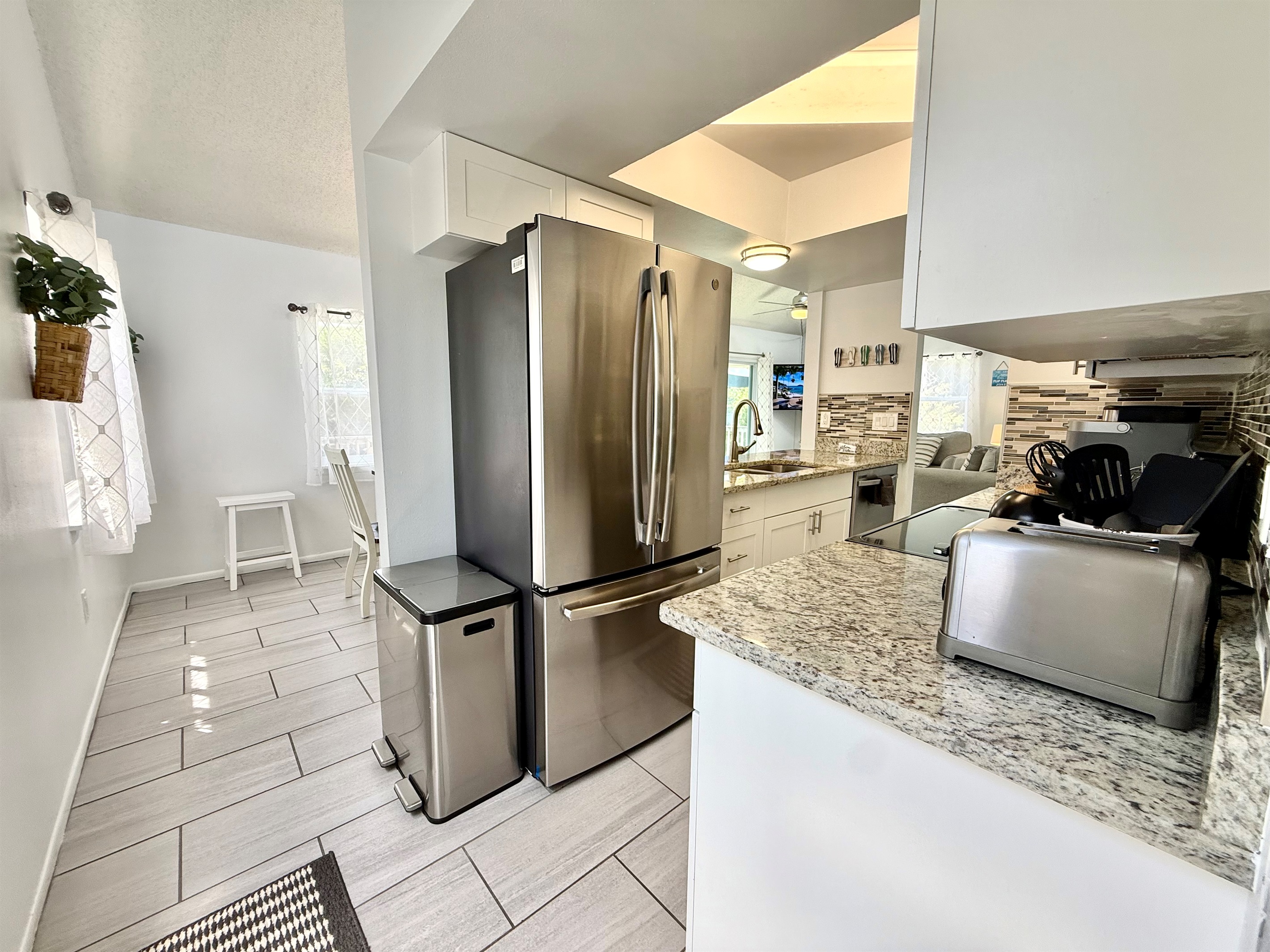 Cook like a pro in this modern kitchen with plenty of counter space, quality cookware, and everything you need for home-cooked favorites.