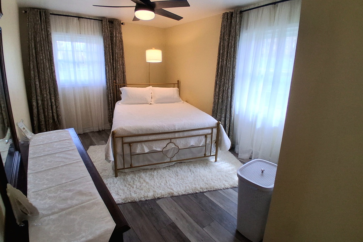 When the windows are open, a gentle country breeze fills the room.  It's so charming and peaceful, with lovely views and a quiet that invites relaxation. A remote-controlled fan and lamp help you set just the right mood.