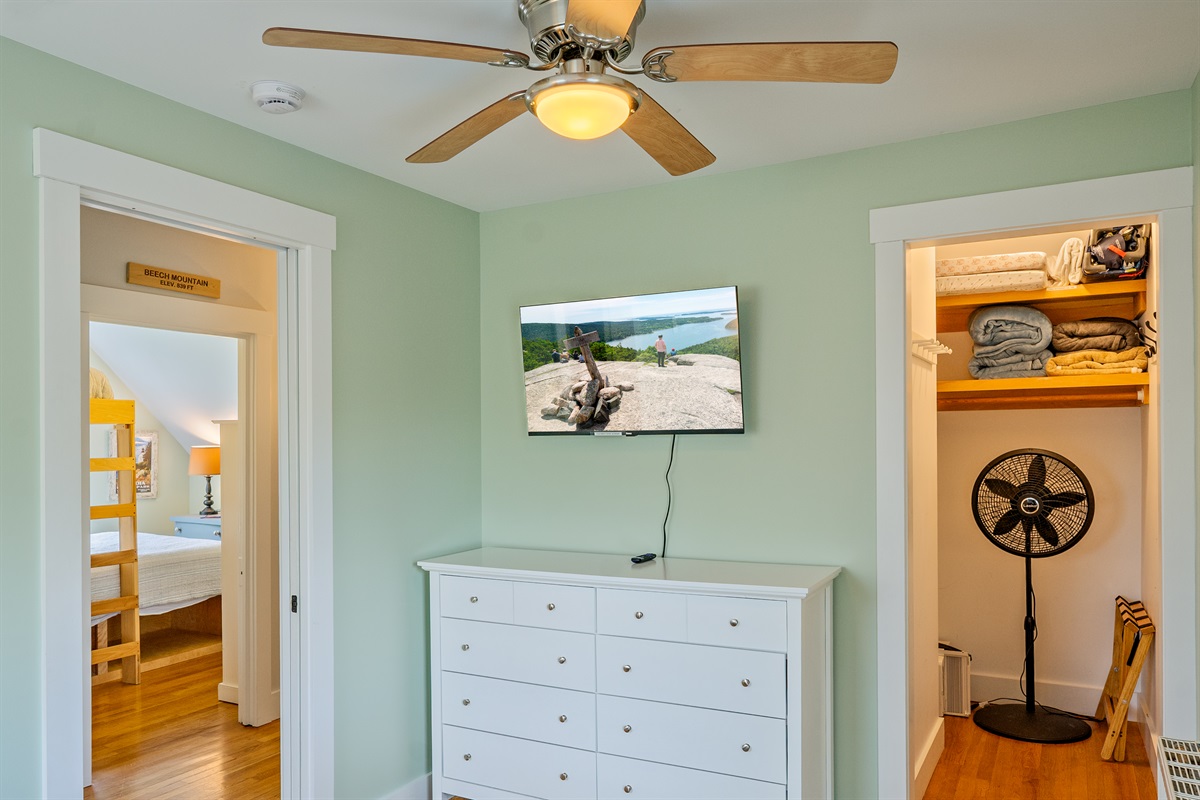 Premier comfort in the Cadillac Room. Features a new wall-mounted Roku TV and a large dresser for extended stays. This family-ready retreat includes a pack ‘n play and baby gates—a tech-ready 1880 basecamp in historic Hall Quarry.