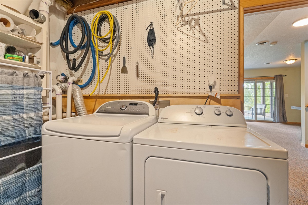 utility room with washer and dryer