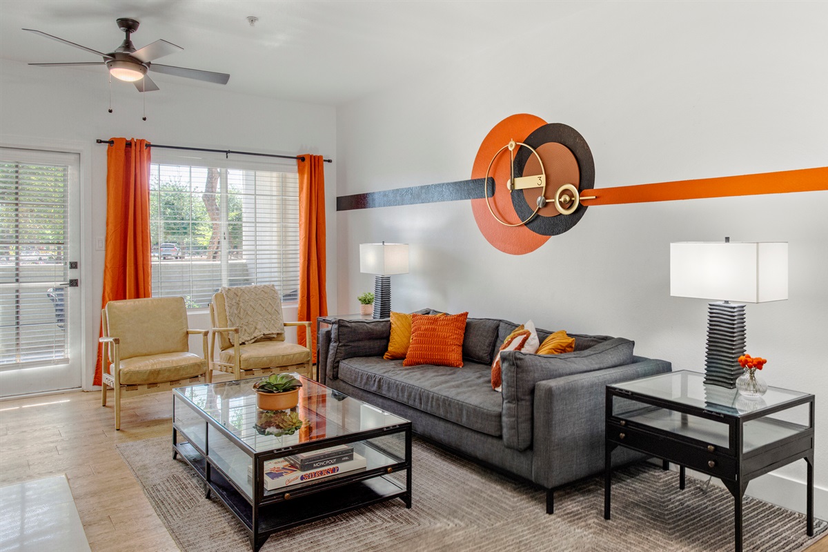 This inviting space is thoughtfully designed with comfortable seating, stylish décor, and a warm atmosphere that makes it easy to unwind after a busy day.