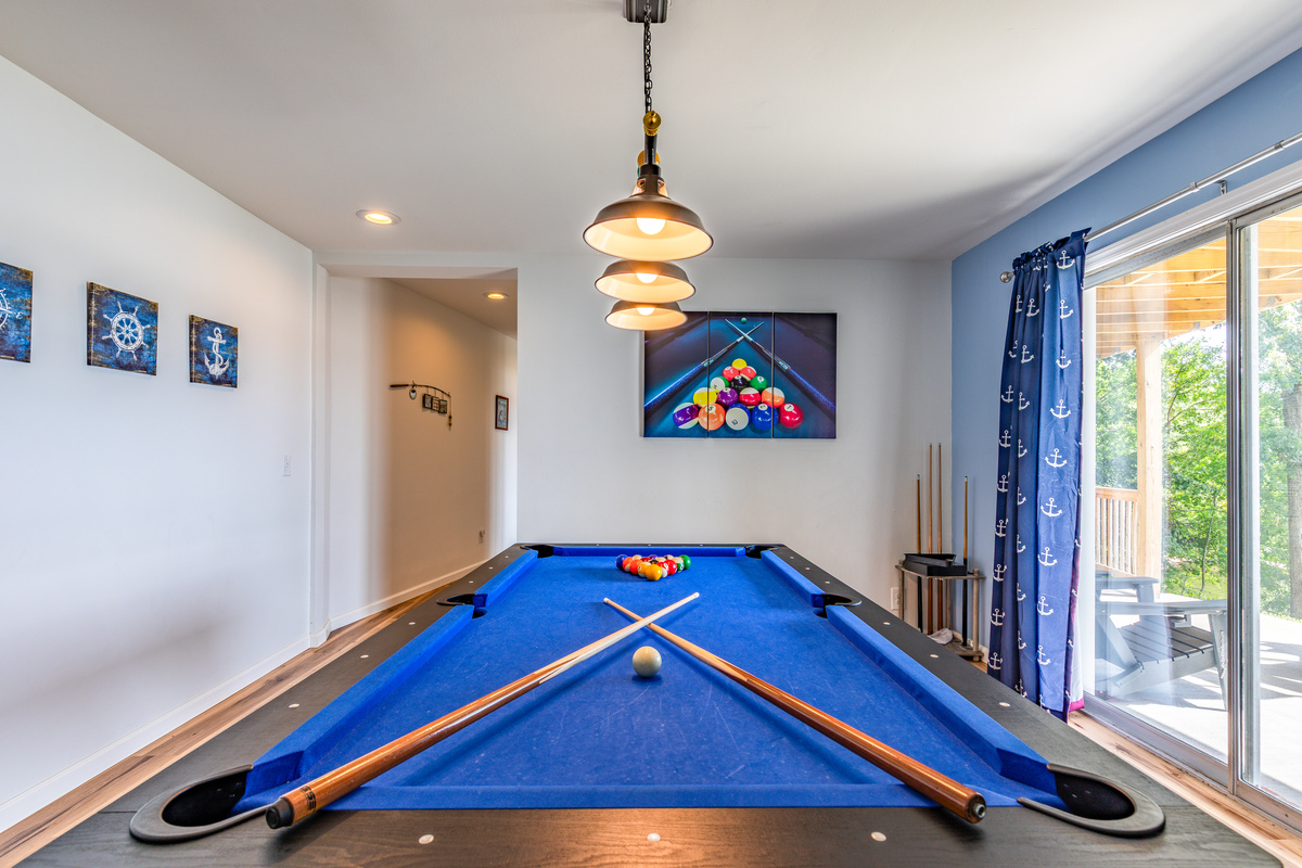 Challenge friends and family to a game of pool with the lakefront deck just outside.