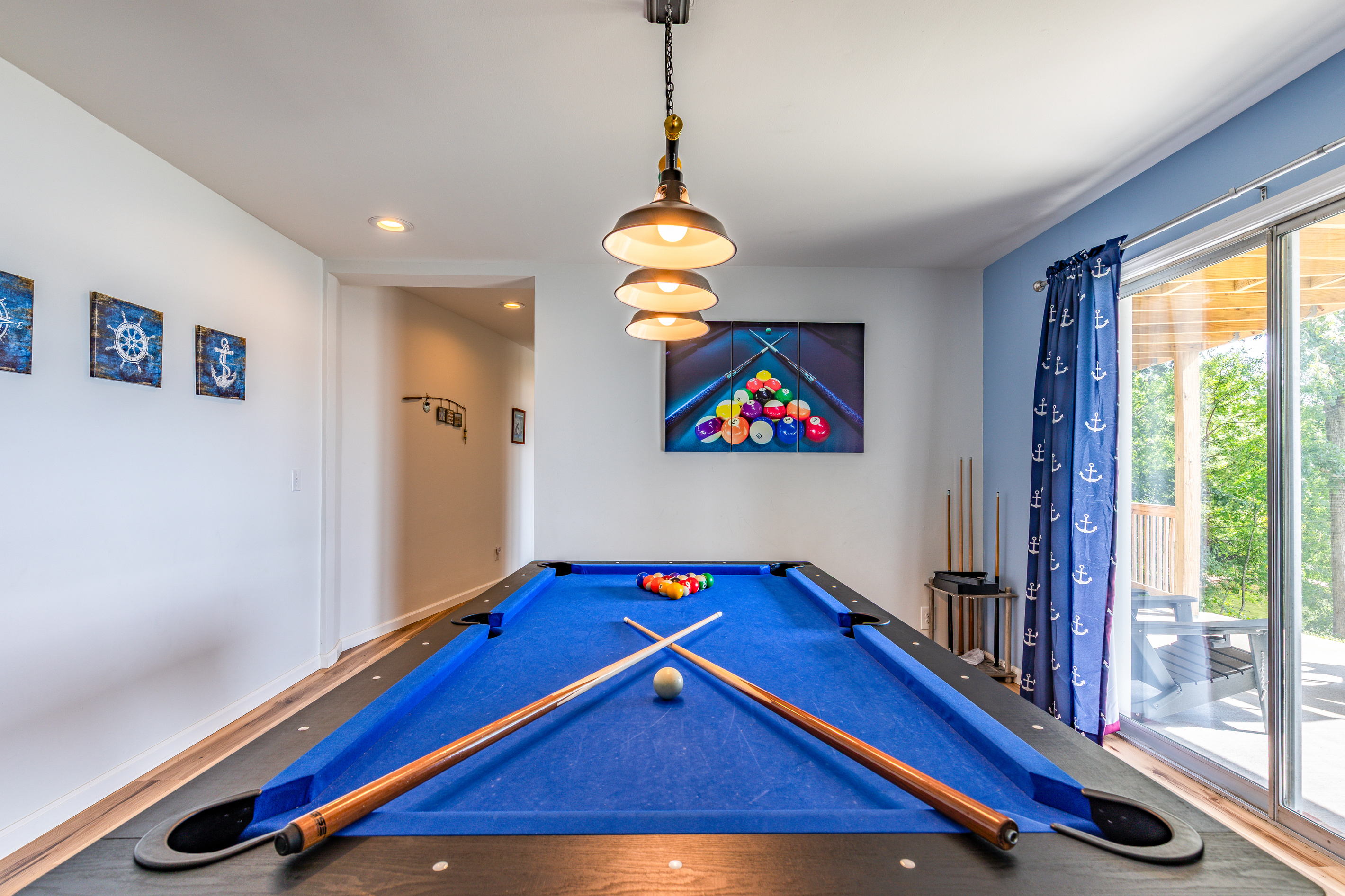 Challenge friends and family to a game of pool with the lakefront deck just outside.