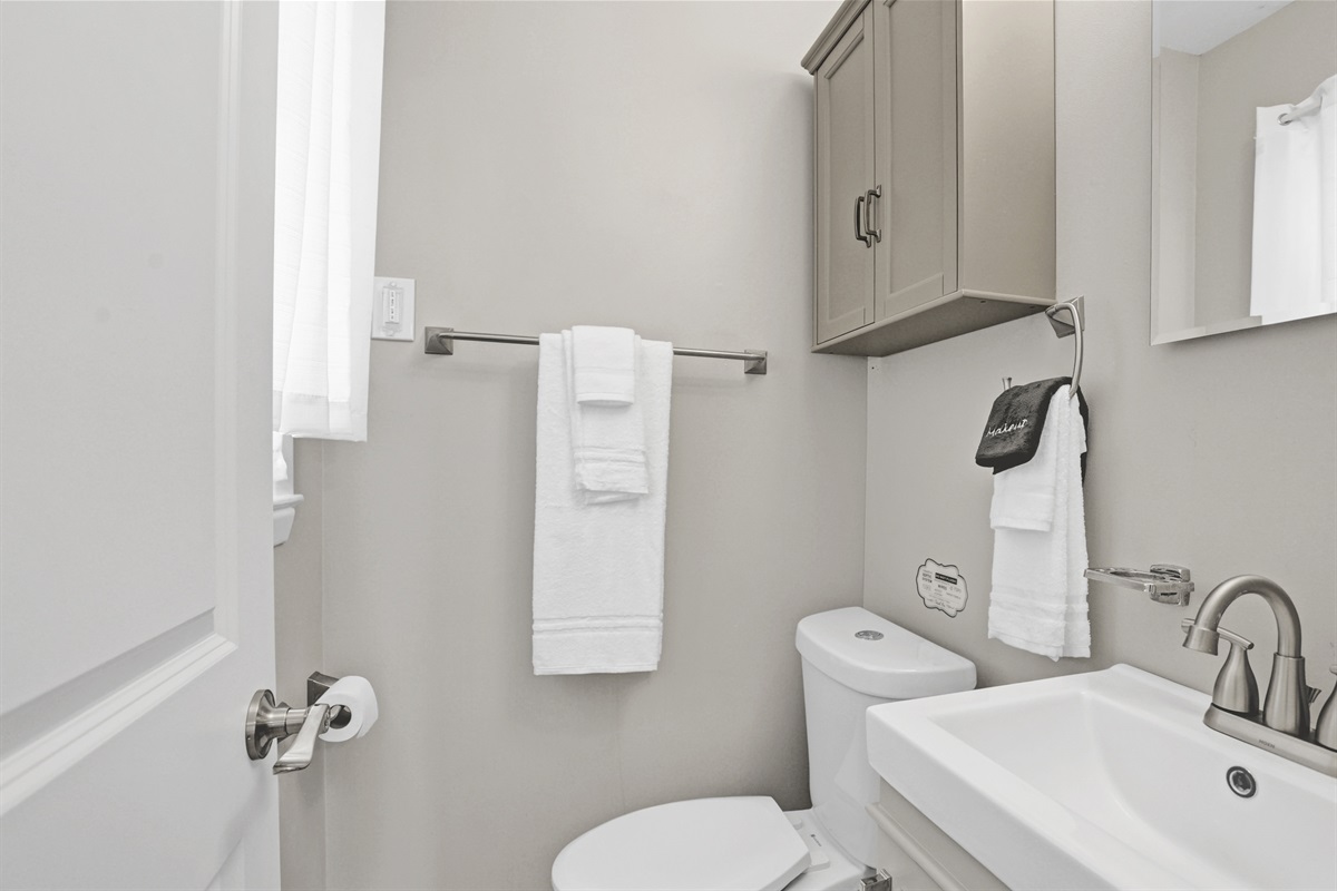 Convenience meets privacy in the ensuite half bath—just steps from the comfort of the king bedroom.