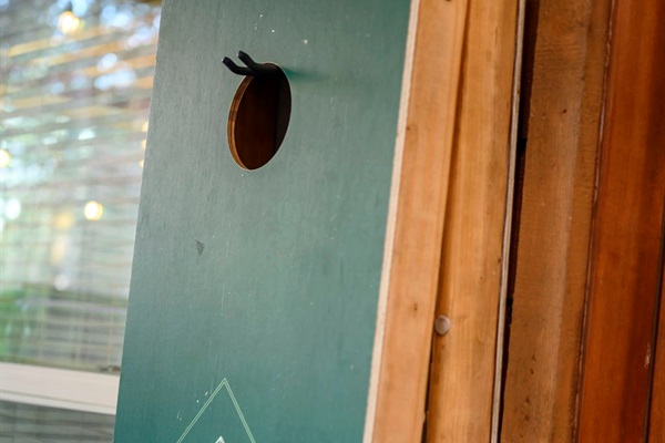 Plenty of yard space for activities. Cornhole set provided.